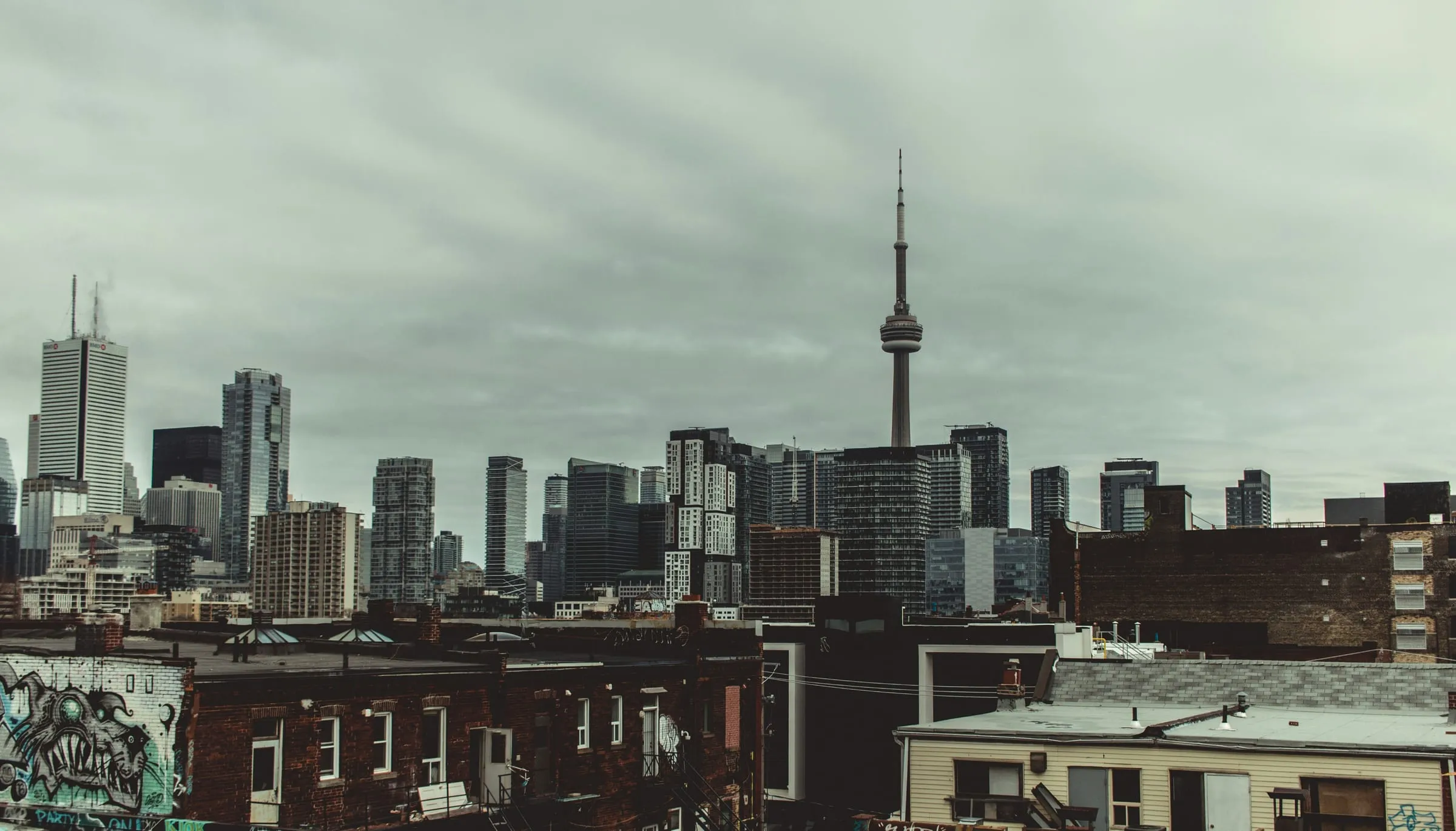 A city skyline with a television tower
